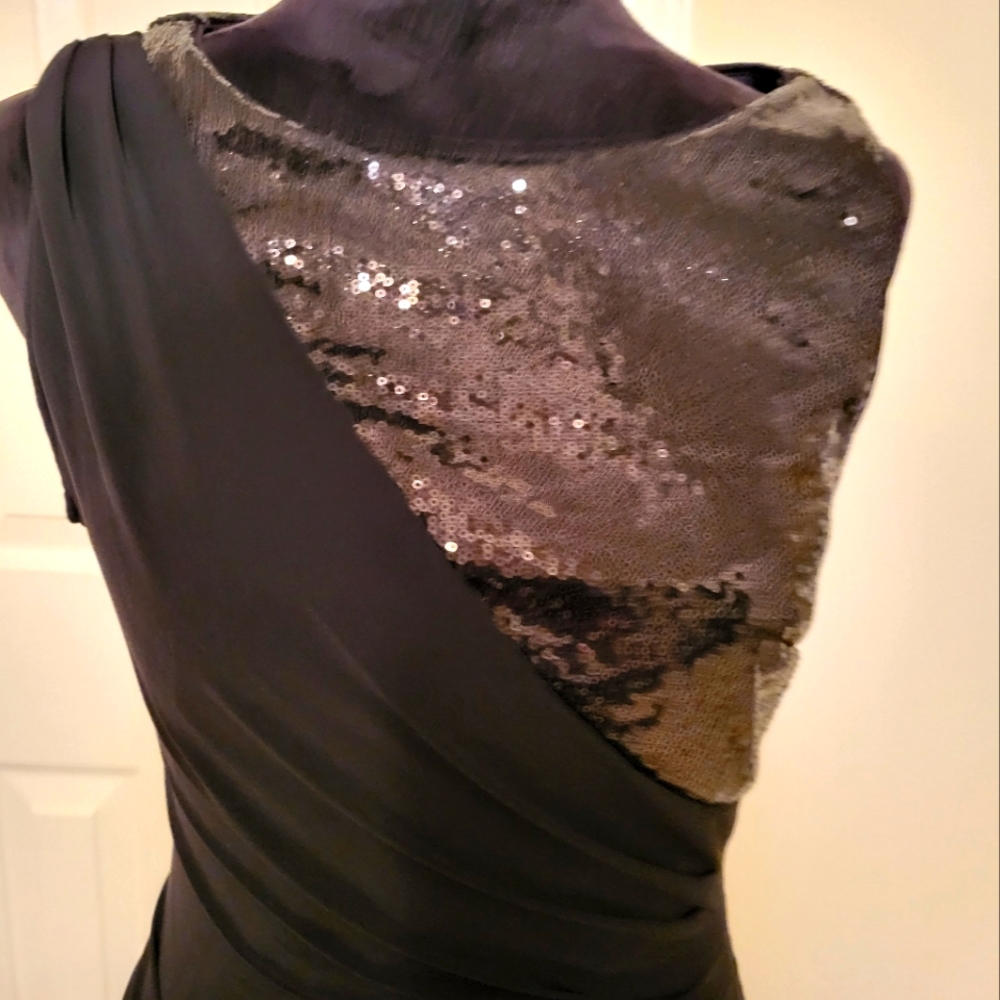 Formal black gown with sequin accent and left left split